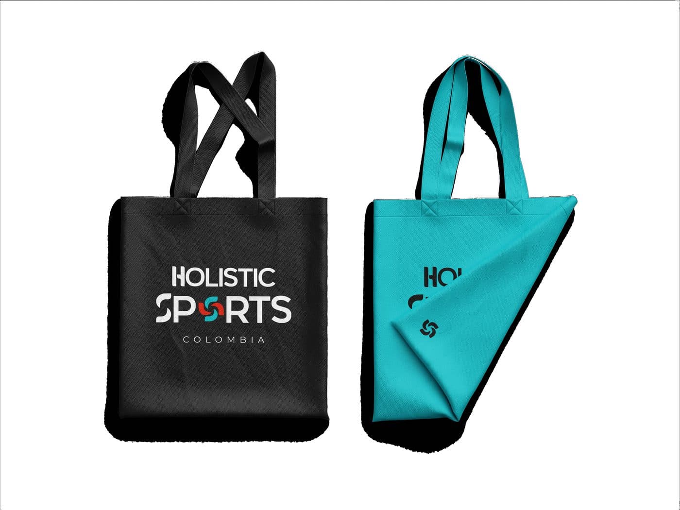 Tote bags de Holistic Sports Colombia en negro y aguamarina